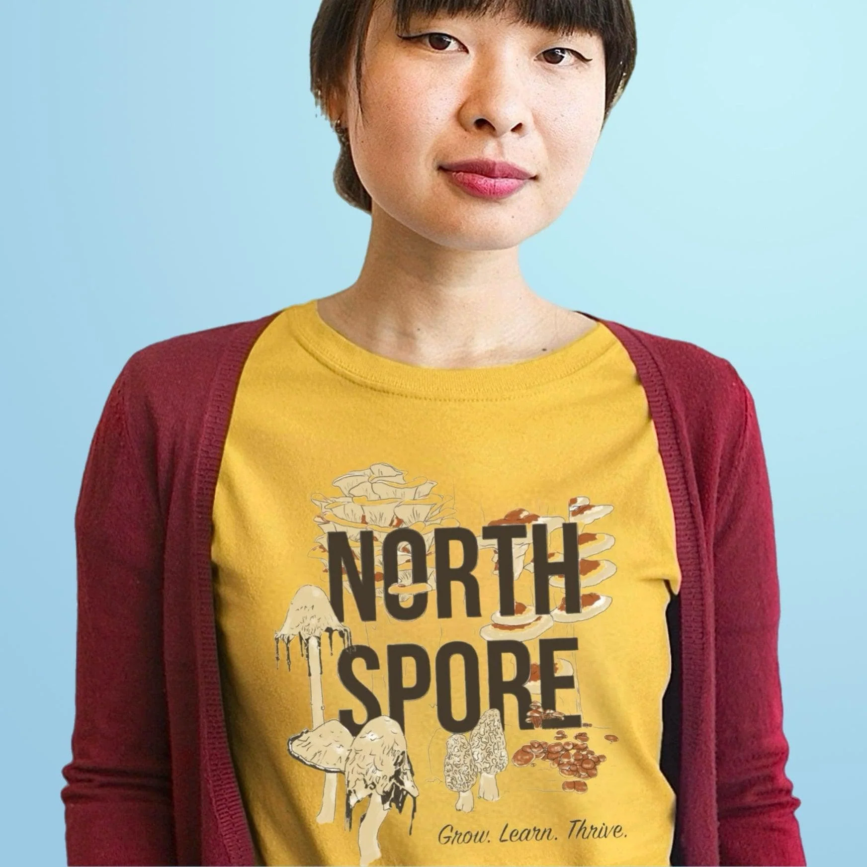 Orange ‘Grow, Learn, Thrive’ North Spore T-Shirt - Image 3